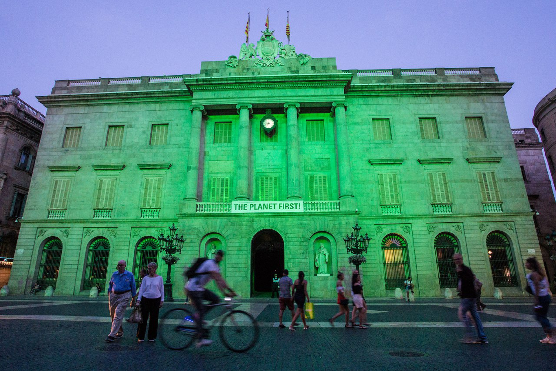 Cities light up green to stand for the Paris Agreement