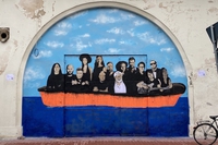 Il nuovo murales di Tvboy sui migranti è un tributo a Francesco Guccini