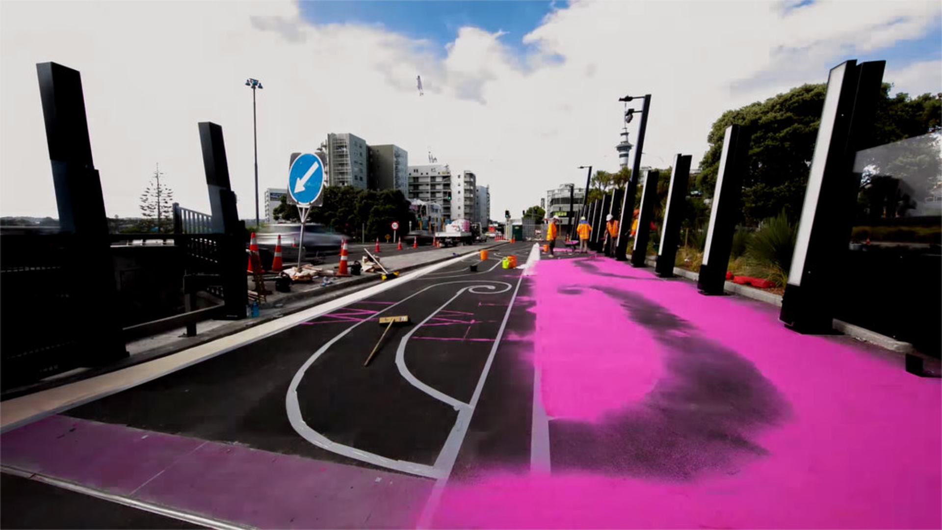 Working on the pink cycling lane: the Maori drawing