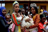 African beauty queens make children with cleft smile