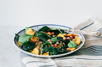Squash salad with black cabbage crisps and pomegranate