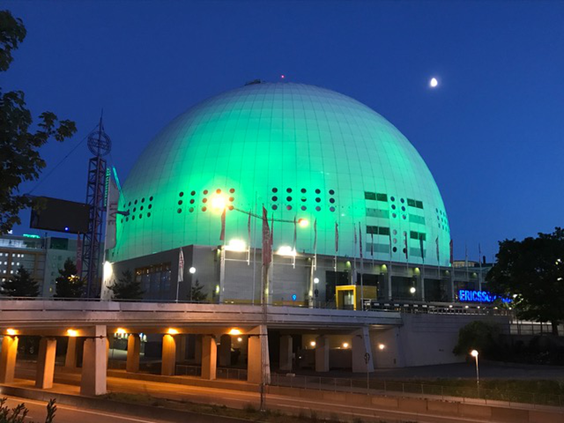 Cities light up green to stand for the Paris Agreement