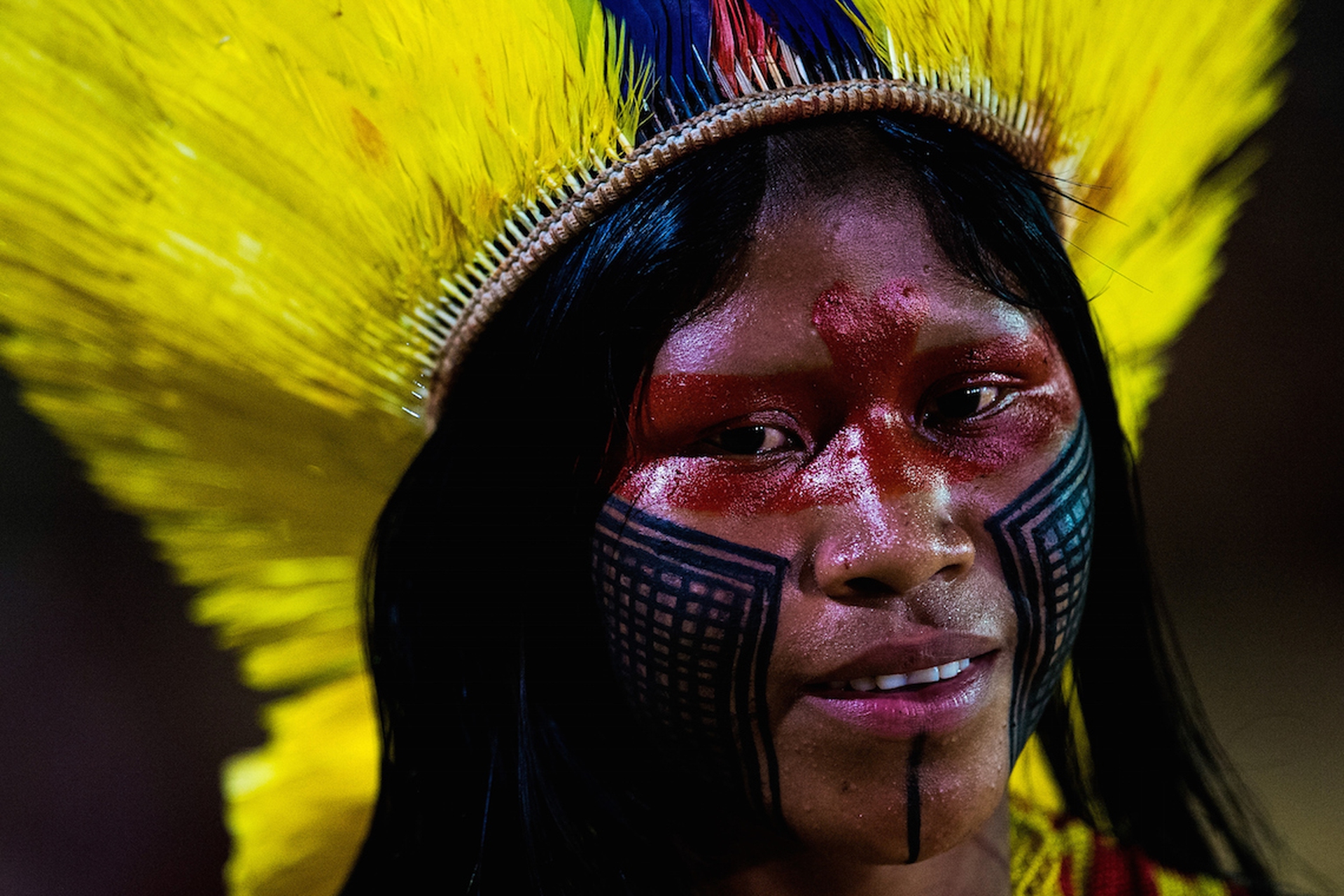 woman-yellow-feathers