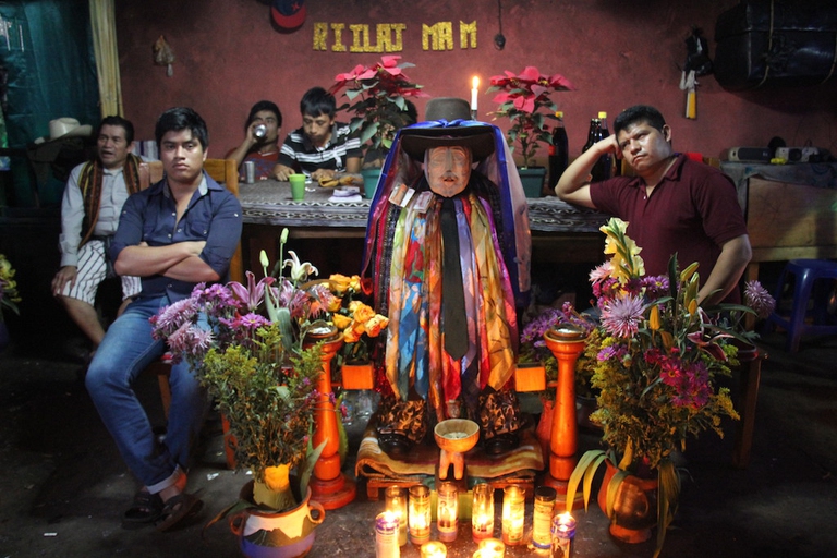 Maximón drinks and smokes together with shamans, keepers and visitors while offering them protection © Sarine Arslanian