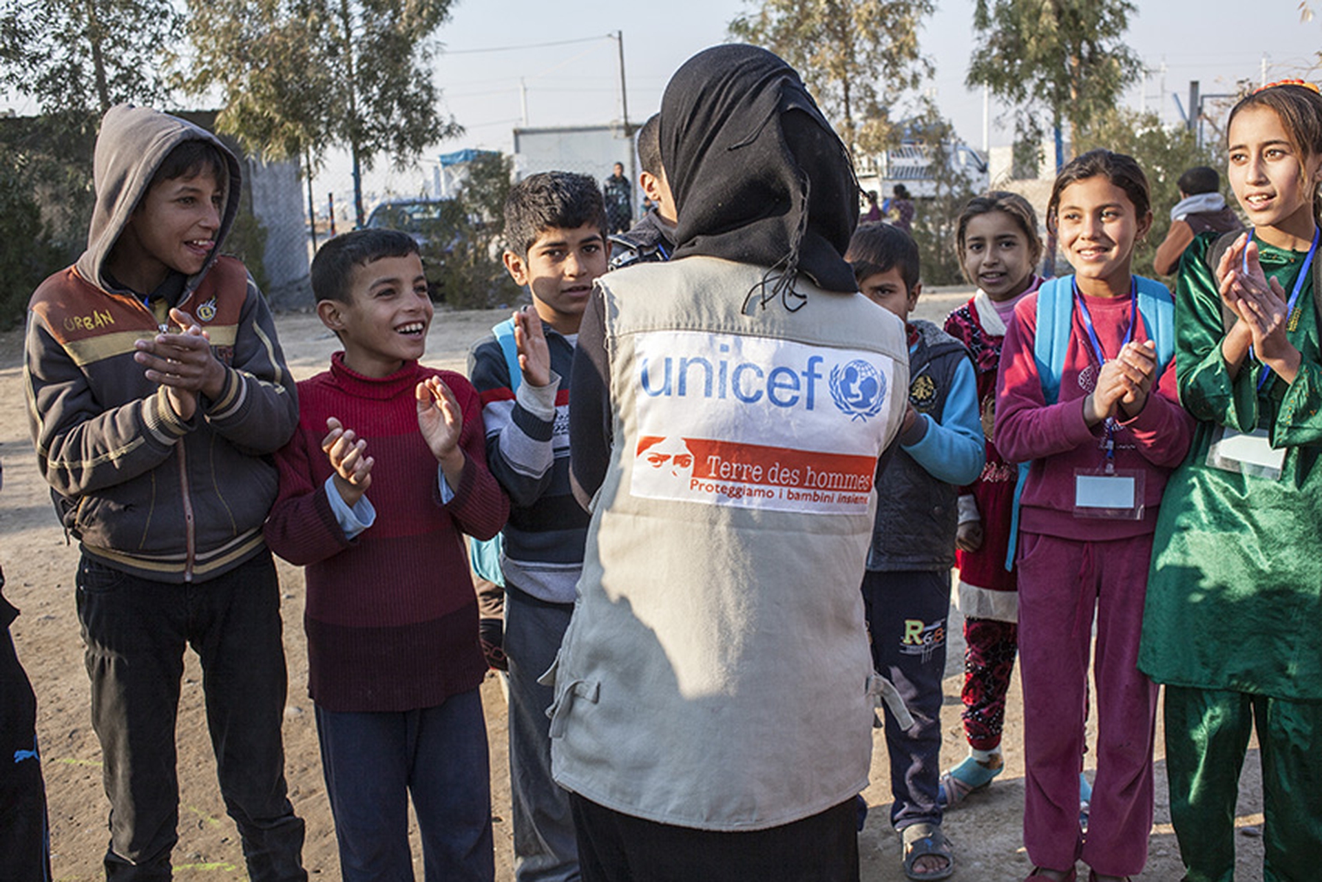 Un gruppo di ragazzi rifugiati e profughi in Iraq