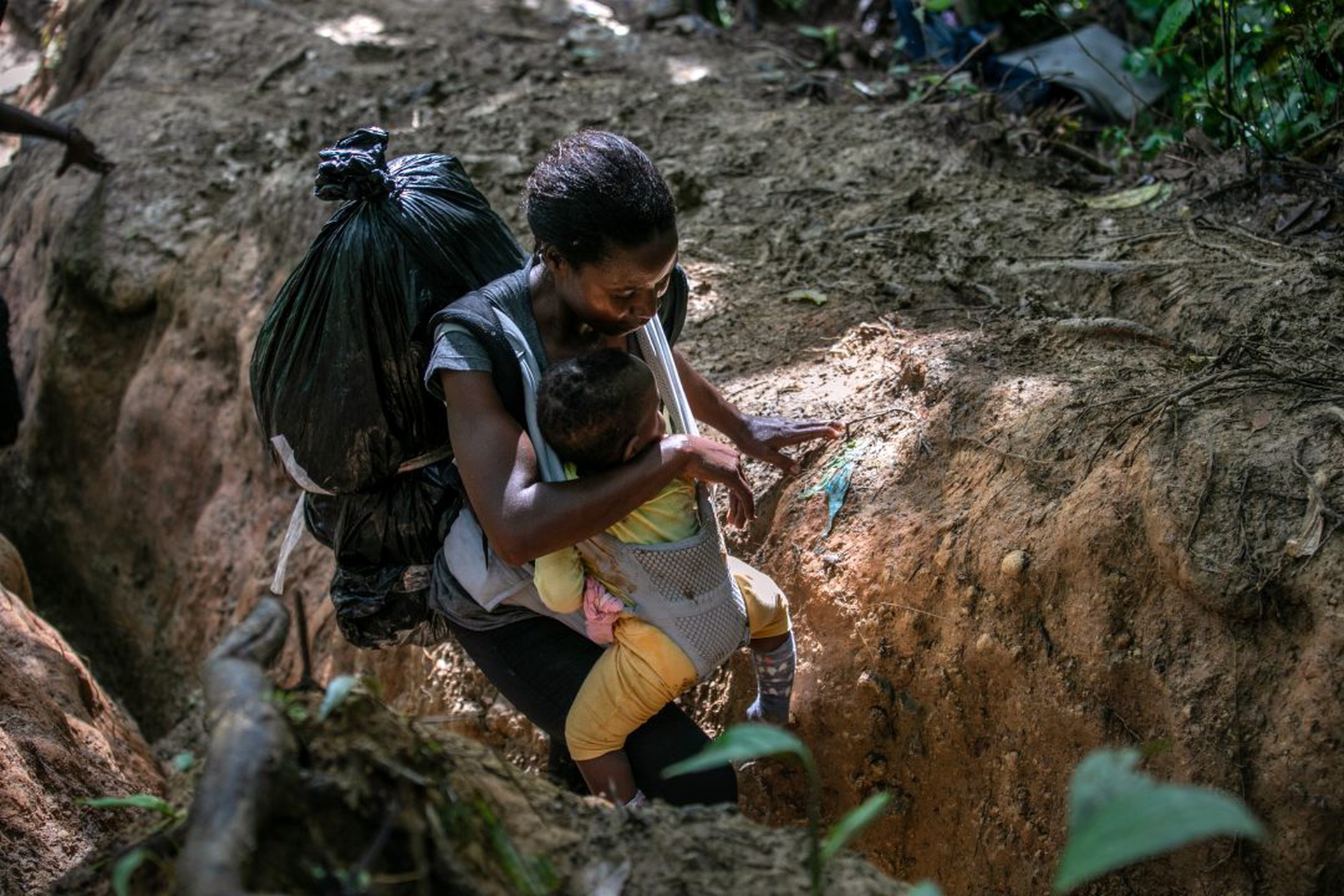 Mostly Haitian Migrants Cross Treacherous Darien Gap En Route To U.S. Border