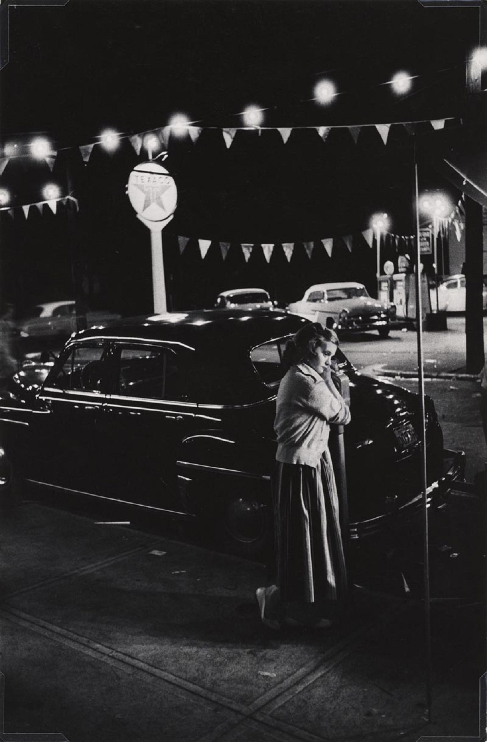 Eugene Smith Girl leaning on a parking meter