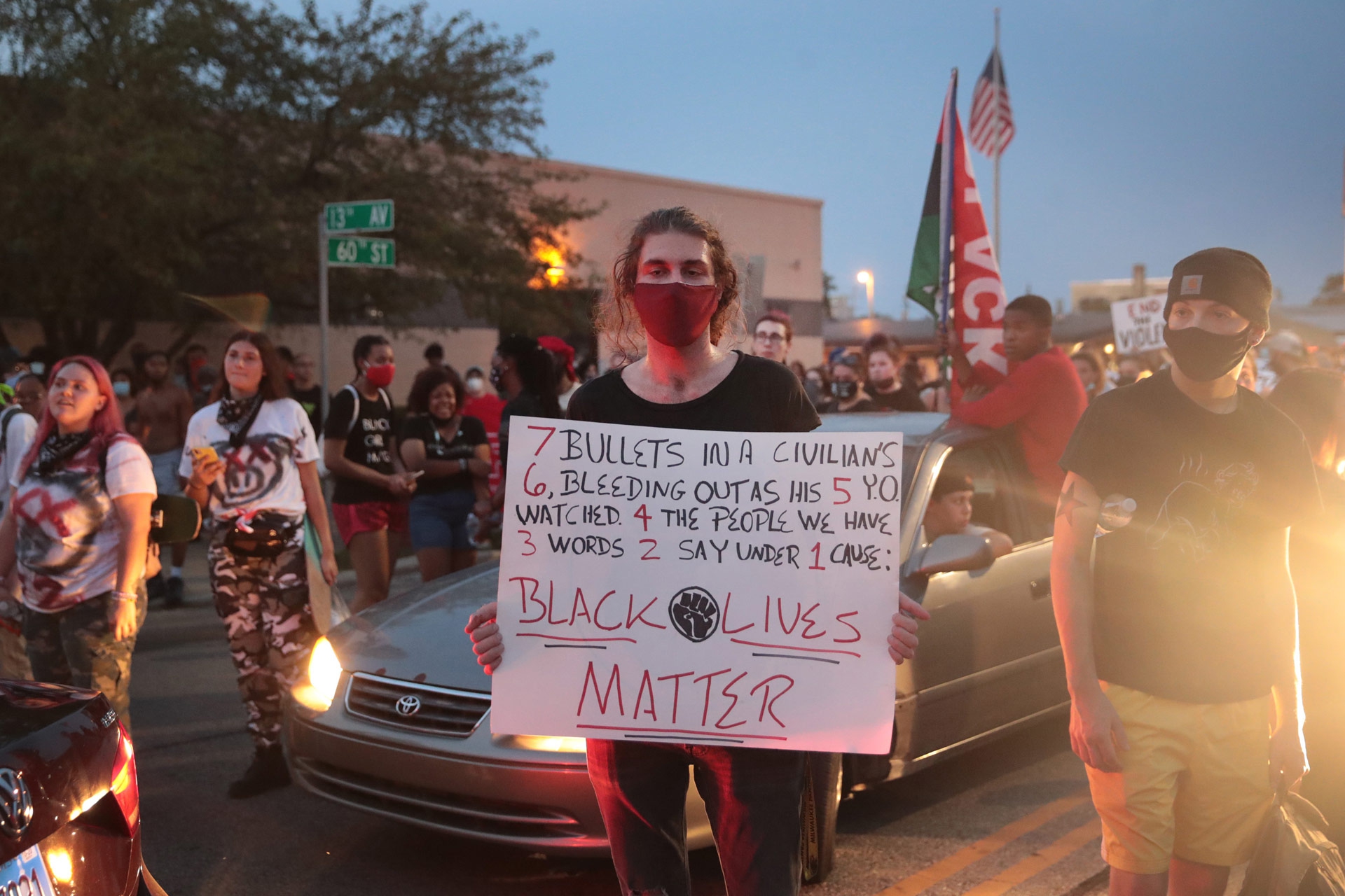 Uno dei cartelli della manifestazione per Jacob Blake