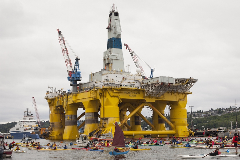 SEATTLE, WA - MAY 16: ShellNo flotilla participants float near the Polar Pioneer oil drilling rig during demonstrations against Royal Dutch Shell on May 16, 2015 in Seattle, Washington. On Saturday demonstrators began three days of protests both on land and on Puget Sound over the presence of the first of two Royal Dutch Shell oil rigs in the Port of Seattle. (Photo by David Ryder/Getty Images)