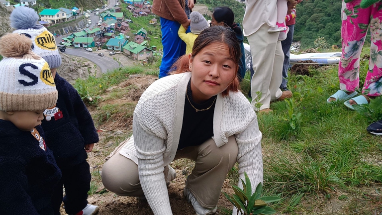 mother planting in sikkim