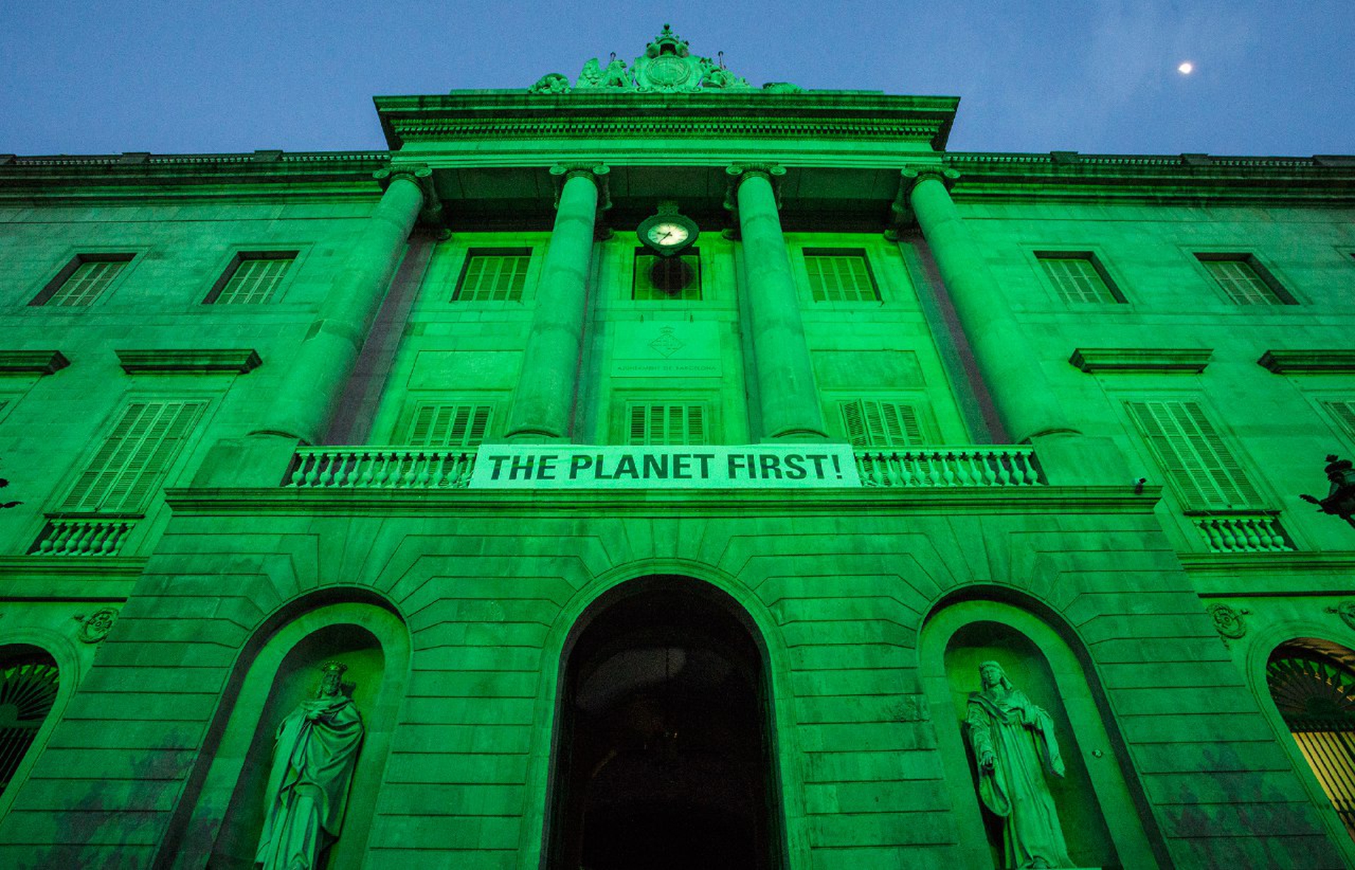 Cities light up green to stand for the Paris Agreement