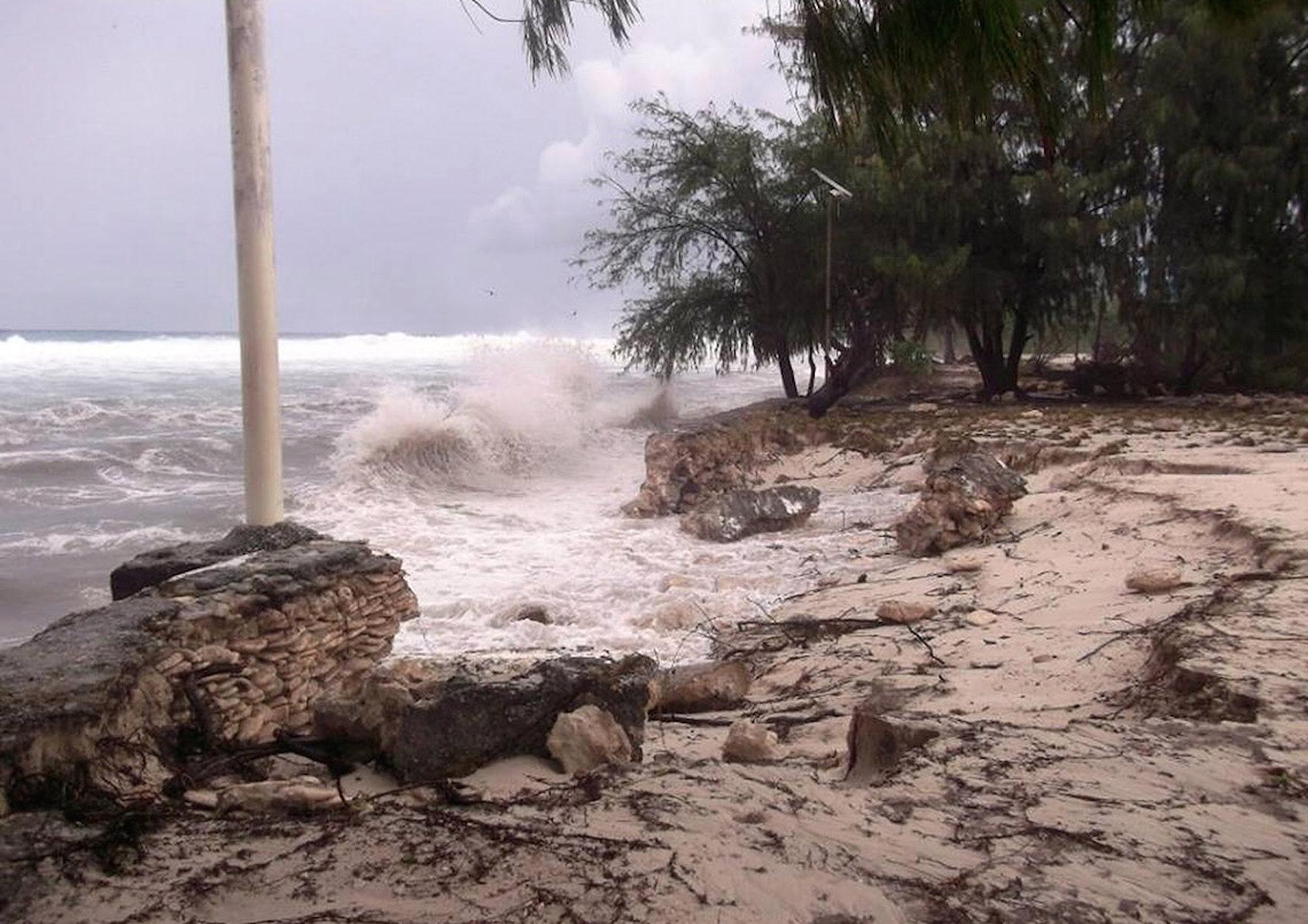 The effects of a hurricane on the island state of Kiribati