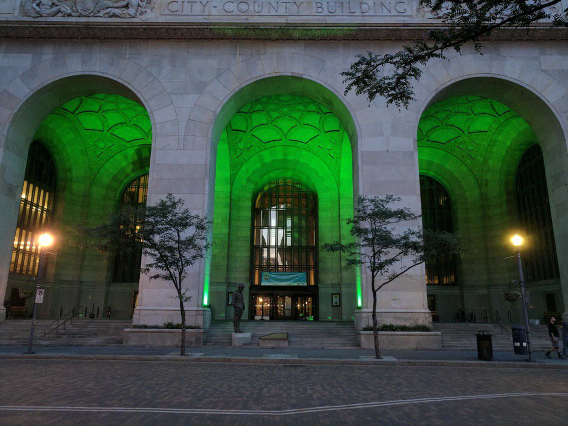 Cities light up green to stand for the Paris Agreement