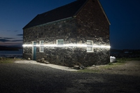 Lines of light on a Scottish island make sea level rise visible