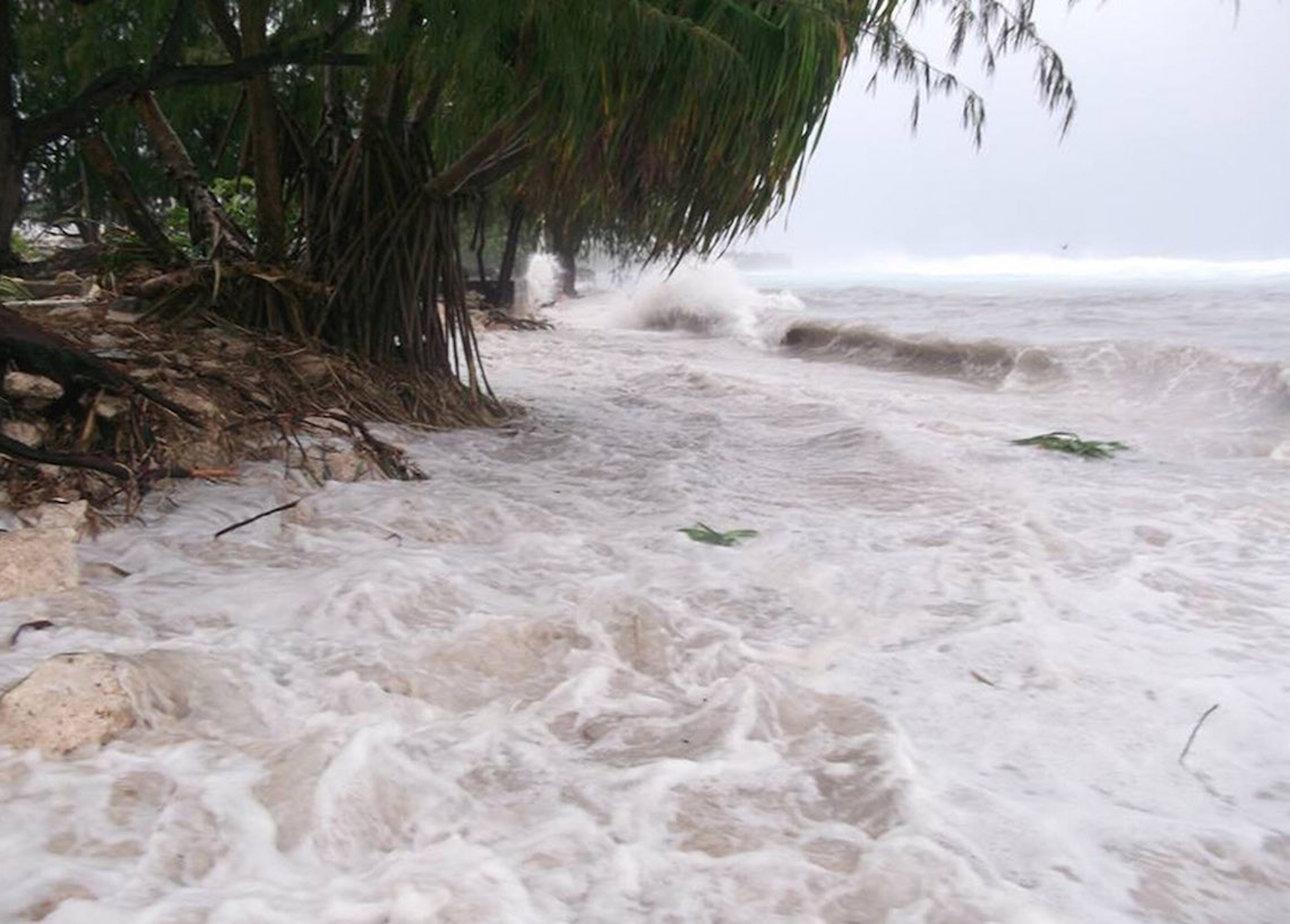 The effects of a hurricane on the island state of Kiribati