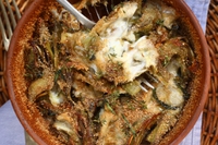 Terrina di carciofi trifolati e scamorza gratinata al forno