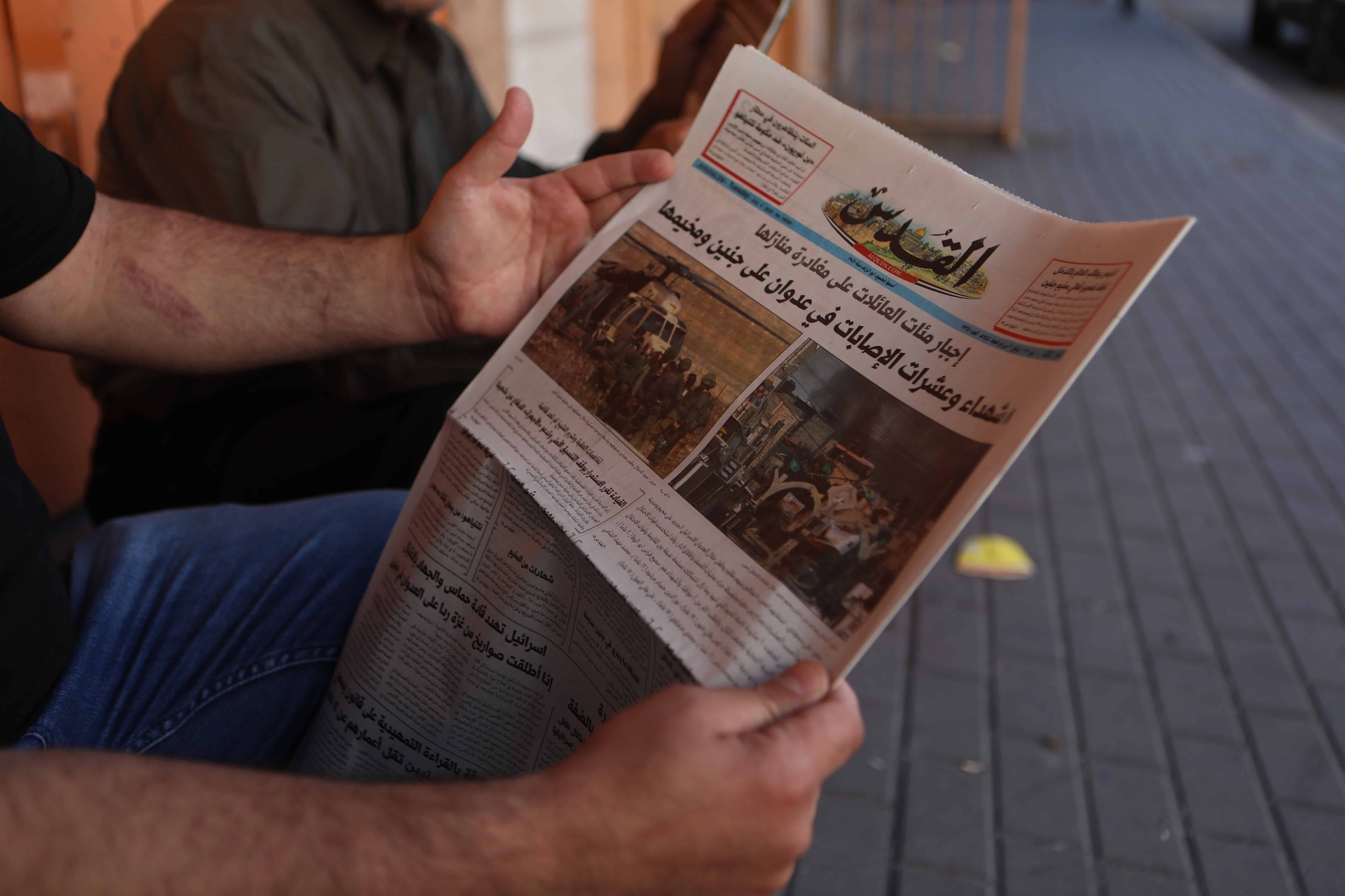 Shopkeepers in Hebron take down shutters responding Israel's attack in Jenin