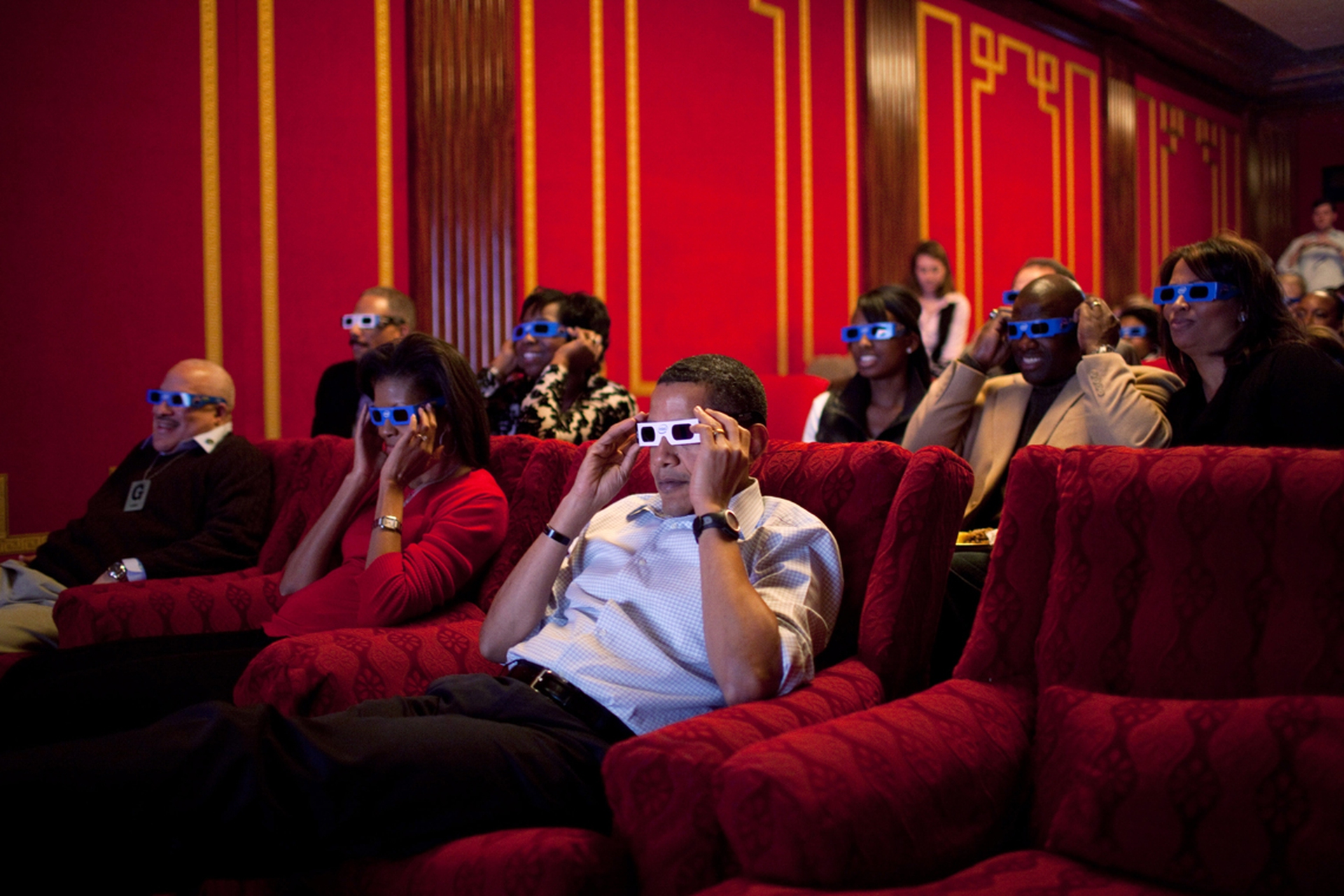 Obama and Michelle wear 3D glasses