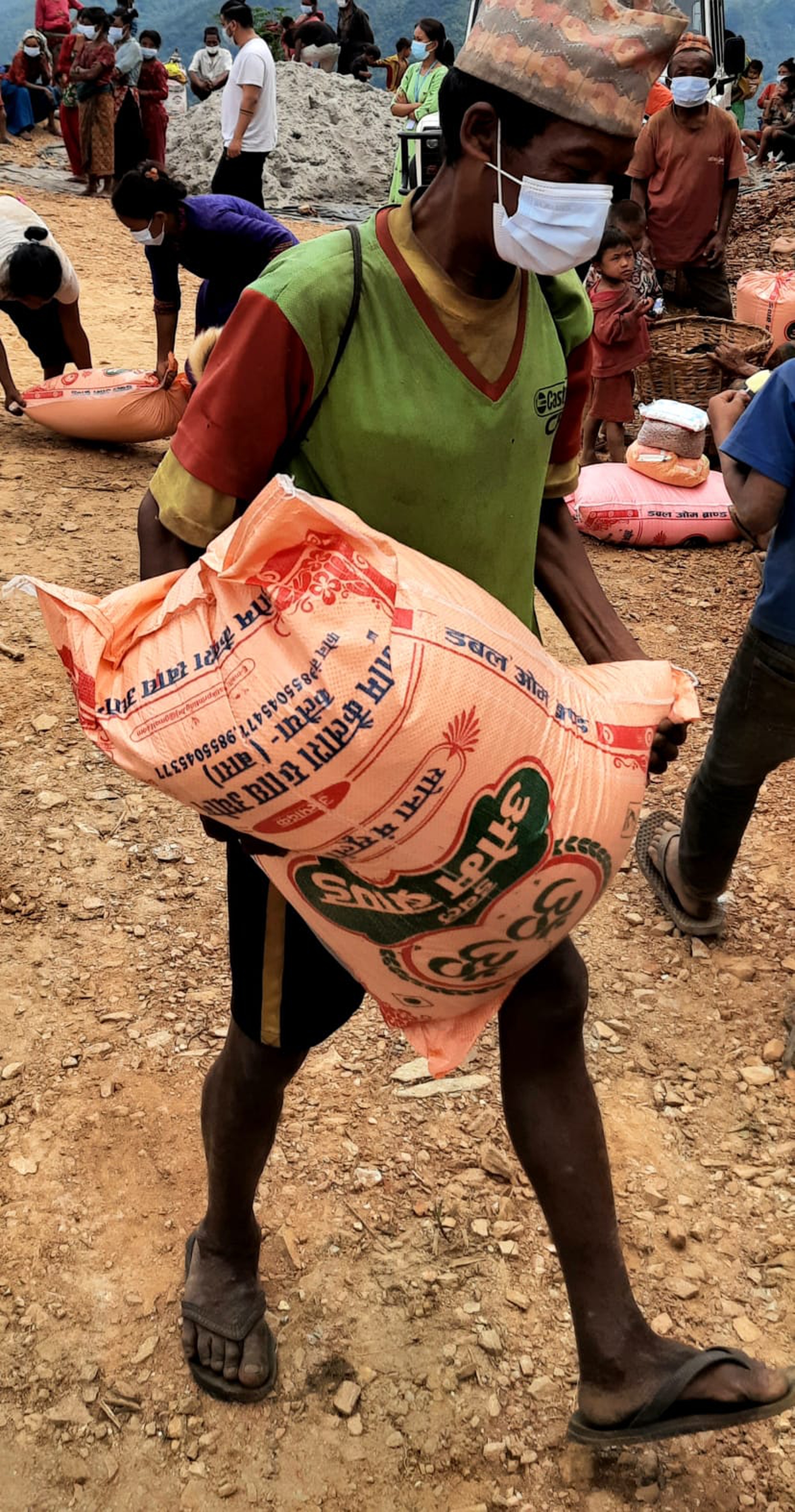 Rice bags being transported and supplied to the poorest areas of rural Nepal. Throughout the pandemic, Gokul and Prakriti did their best to help the most vulnerable families in rural Nepal, amongst the people who suffered the most.