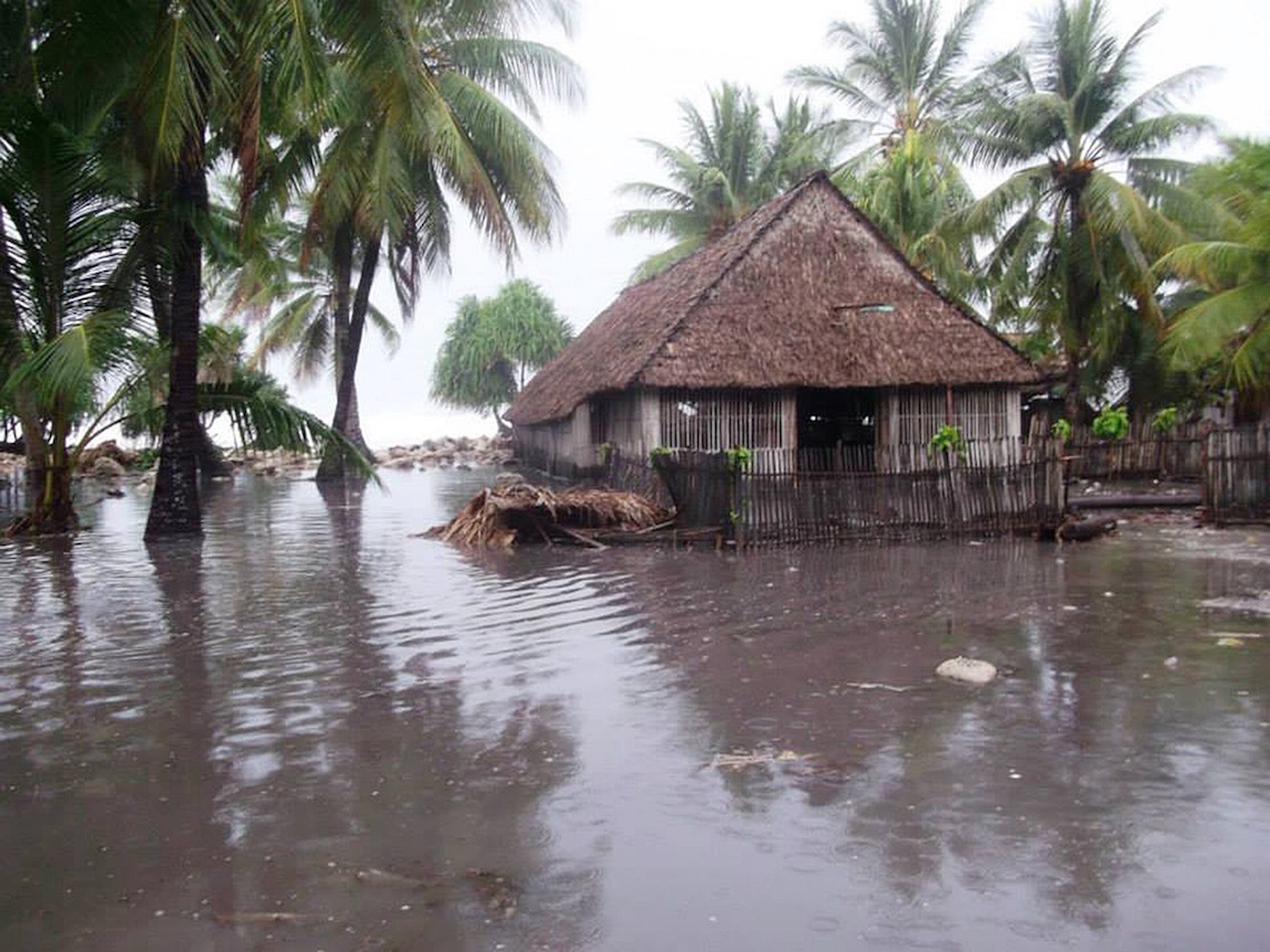 The effects of a hurricane on the island state of Kiribati