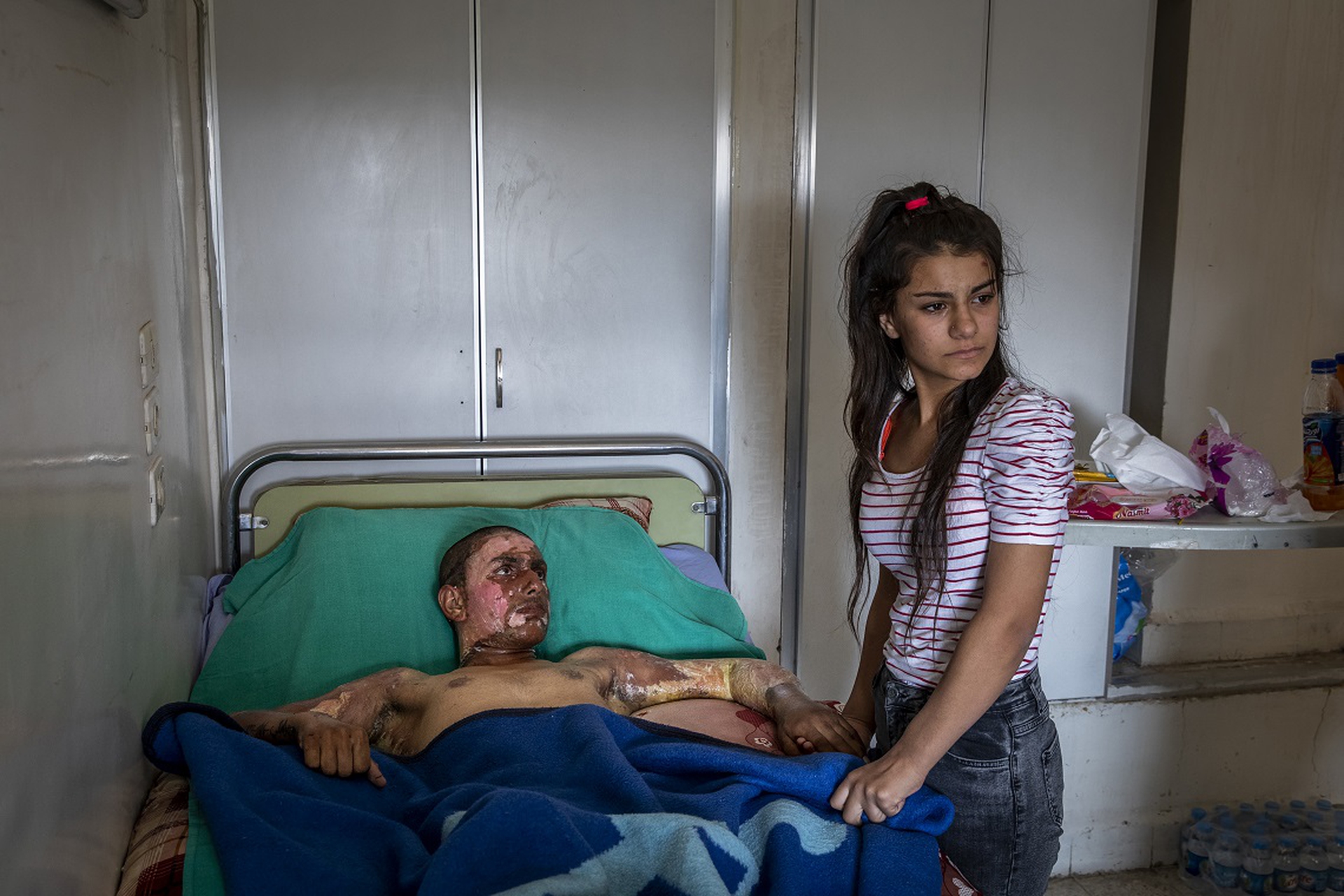 Injured Kurdish Fighter Receives Hospital Visit, Ivor Prickett, World Press Photo 2020