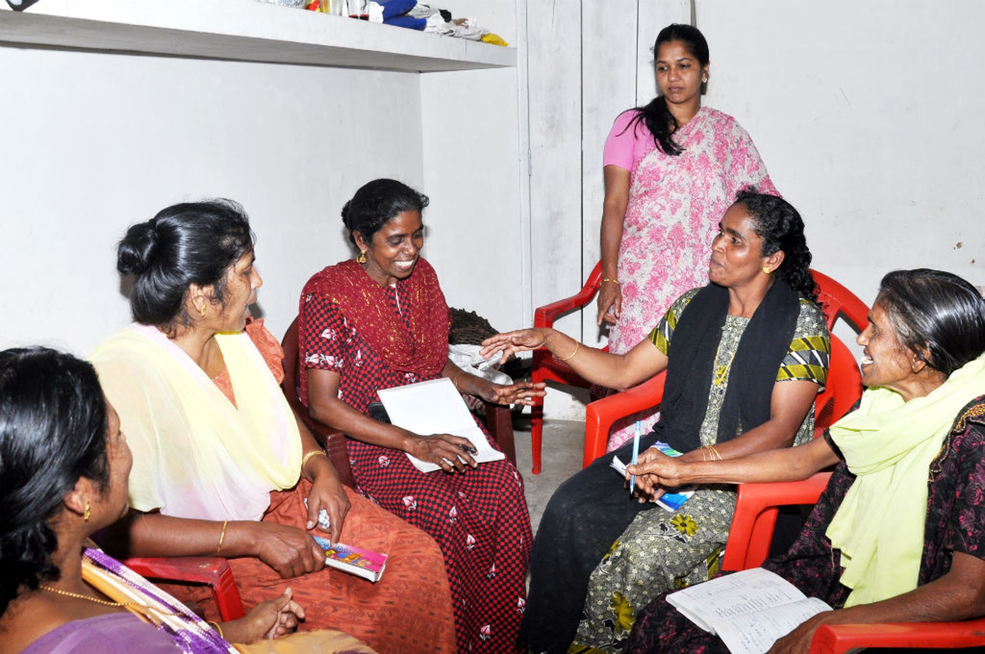 03_Financial Education training_Small group discussion being facilitated by trainer Ms