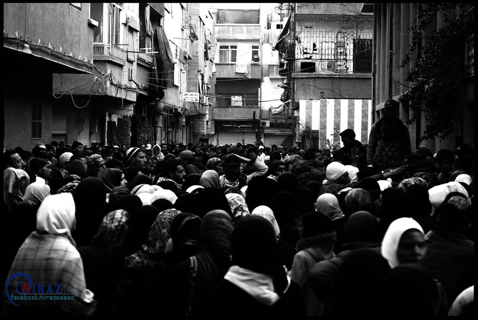 La fila per il cibo a Yarmouk. 27 Febbraio 2014 © Foto d'archivio/ Niraz Saied