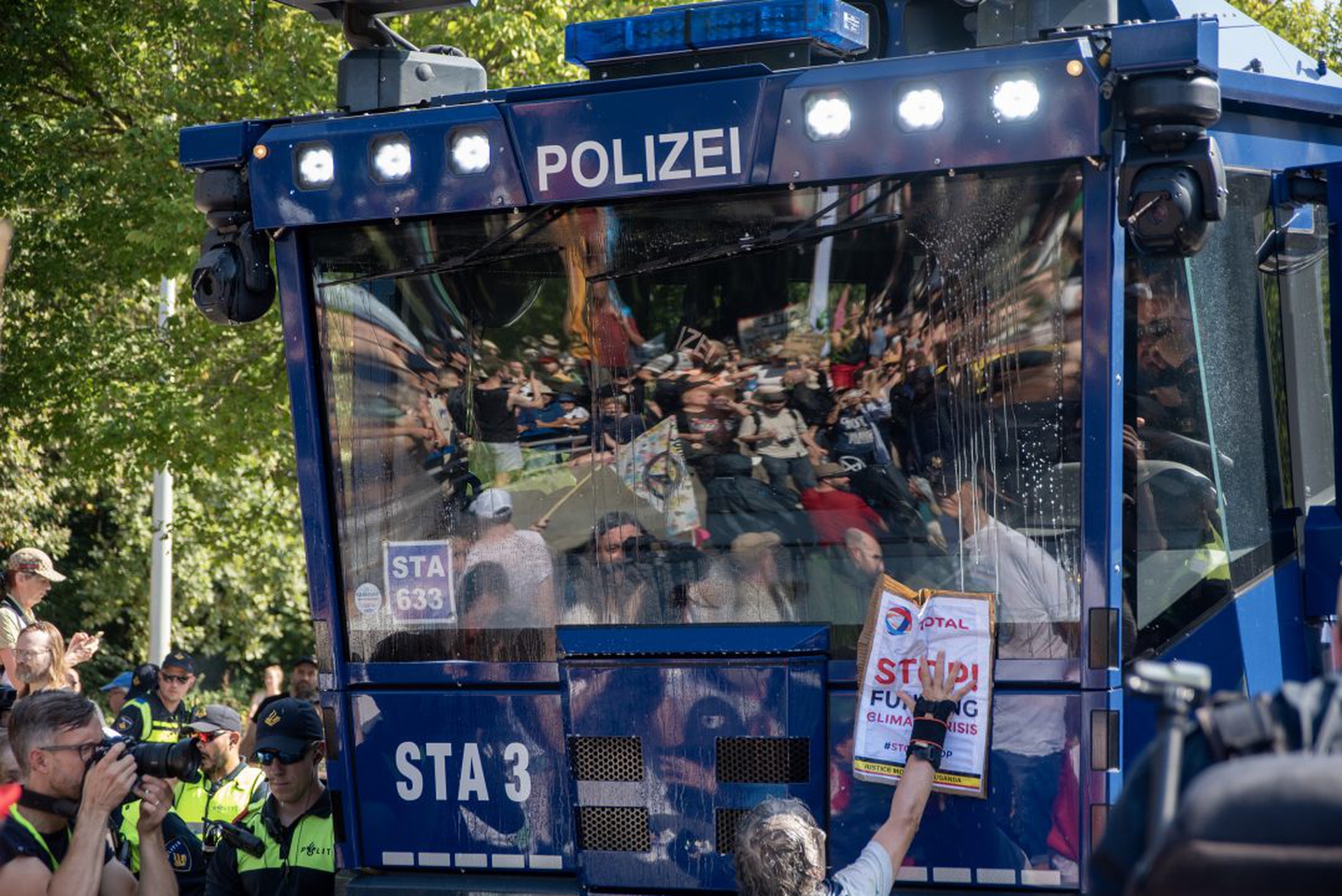 A protester put a paper to express her opinion on the window