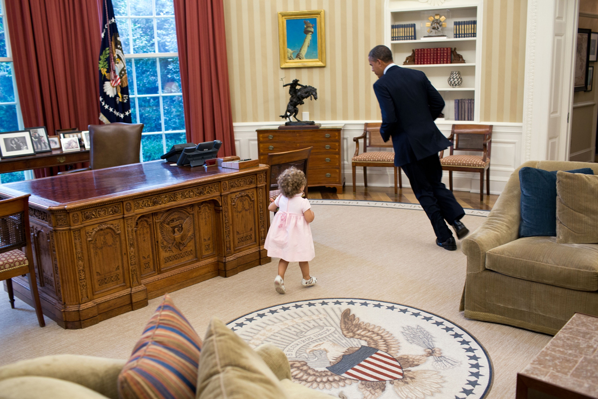 Obama plays with a kid