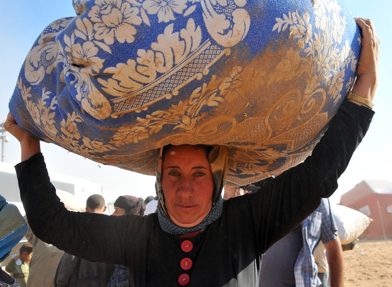 Una rifugiata siriana di origine curda entra in Turchia unhcr-1