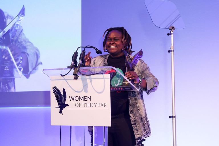 nzambi matte winning the women of the year eco-champion award