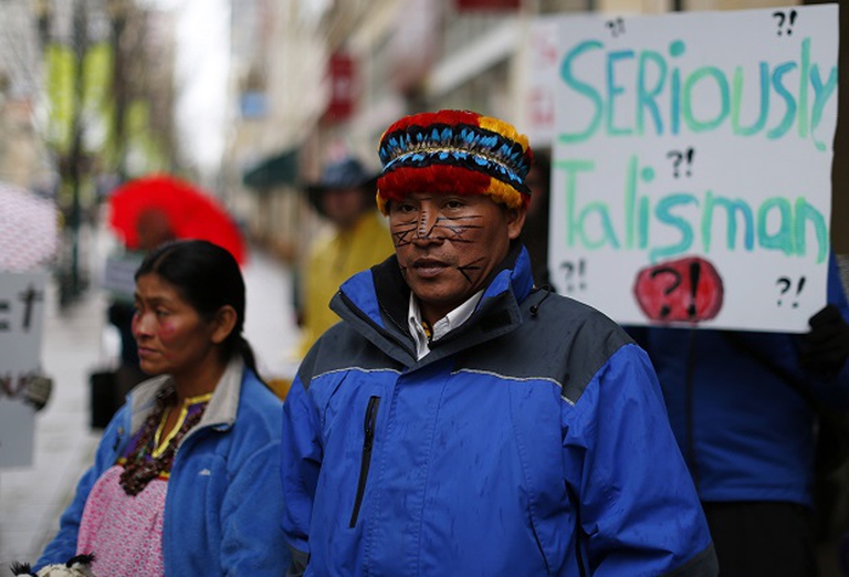 Achuar Leaders from Peru protest outside Talisman Energy's annual general meeting in Calgary