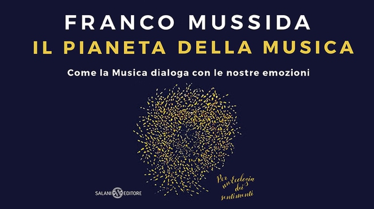 La copertina blu del libro Il pianeta della Musica di Franco Mussida.