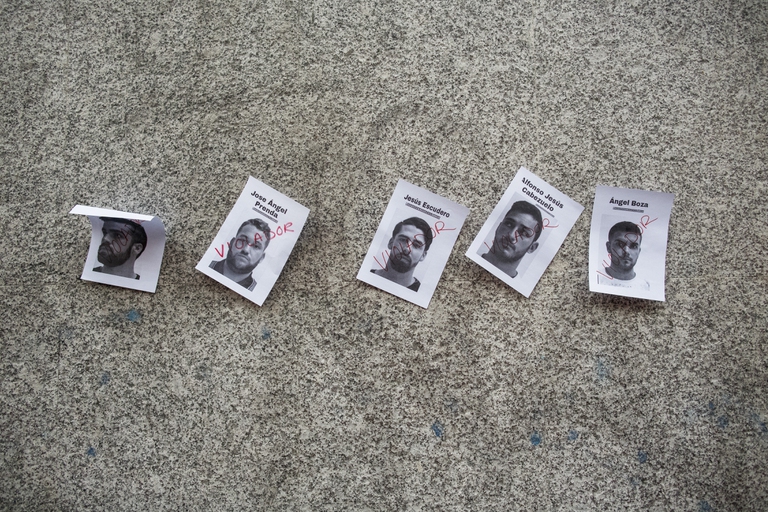 MADRID, SPAIN - APRIL 26: Pictures depicting the members of 'La Manada' are stuck to the wall during a demonstration against the verdict of the 'La Manada' (Wolf Pack) gang case outside the Minister of Justice on April 26, 2018 in Madrid, Spain. The High Court of Navarra has given a sentence of 9 years in prison to five men for 'continued sexual abuse' instead of 'rape', which would have seen them recieve around 22 years in prison. The gang assaulted an 18-year-old woman in Pamplona, during the San Fermin Festival in 2016. Feminists and women's rights groups have called for demonstrations across Spain. (Photo by Pablo Blazquez Dominguez/Getty Images)