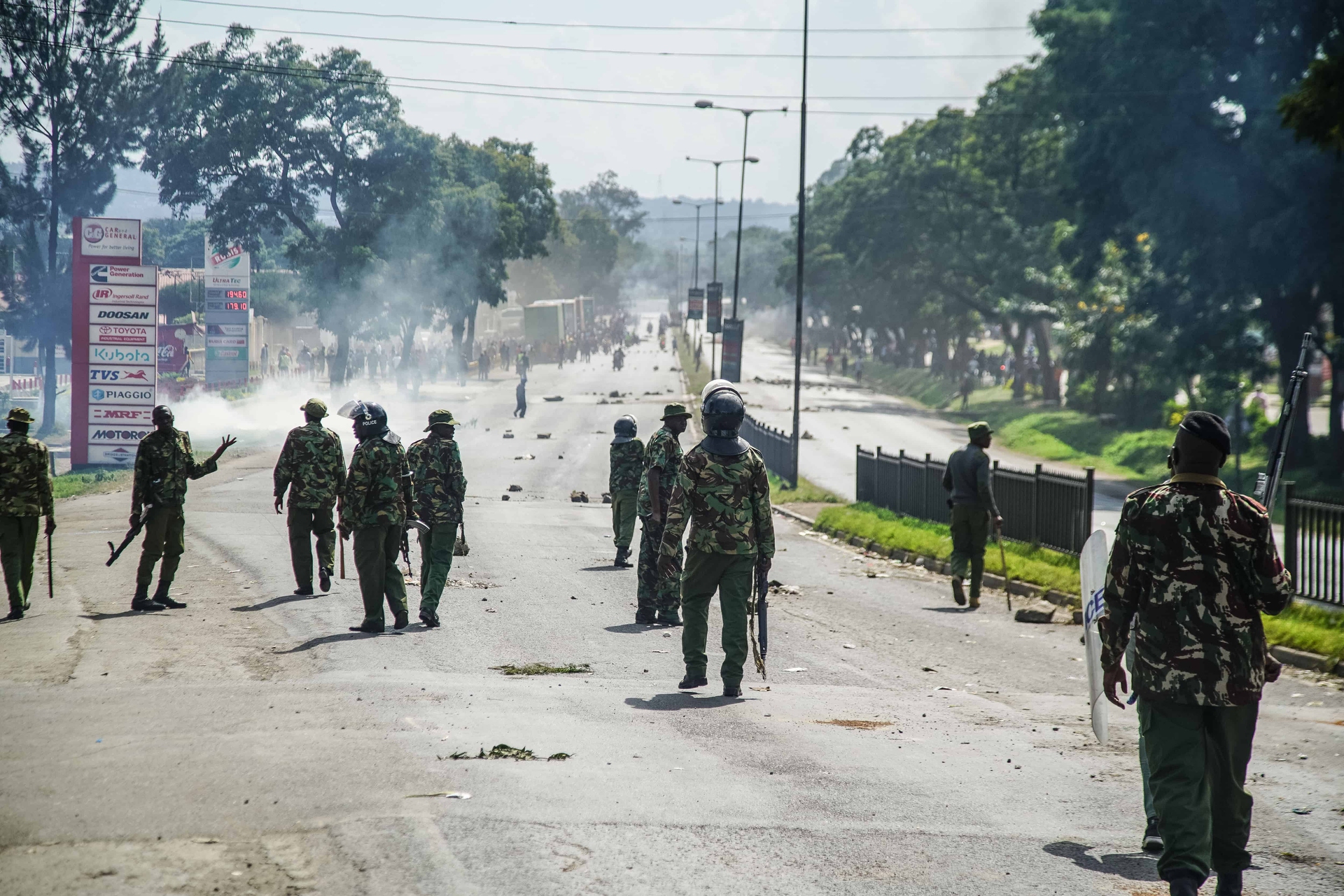 Anti-riot police take their position and attempt to disperse
