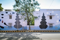 A Nuova Delhi un murales contro i cambiamenti climatici realizzato con lo smog