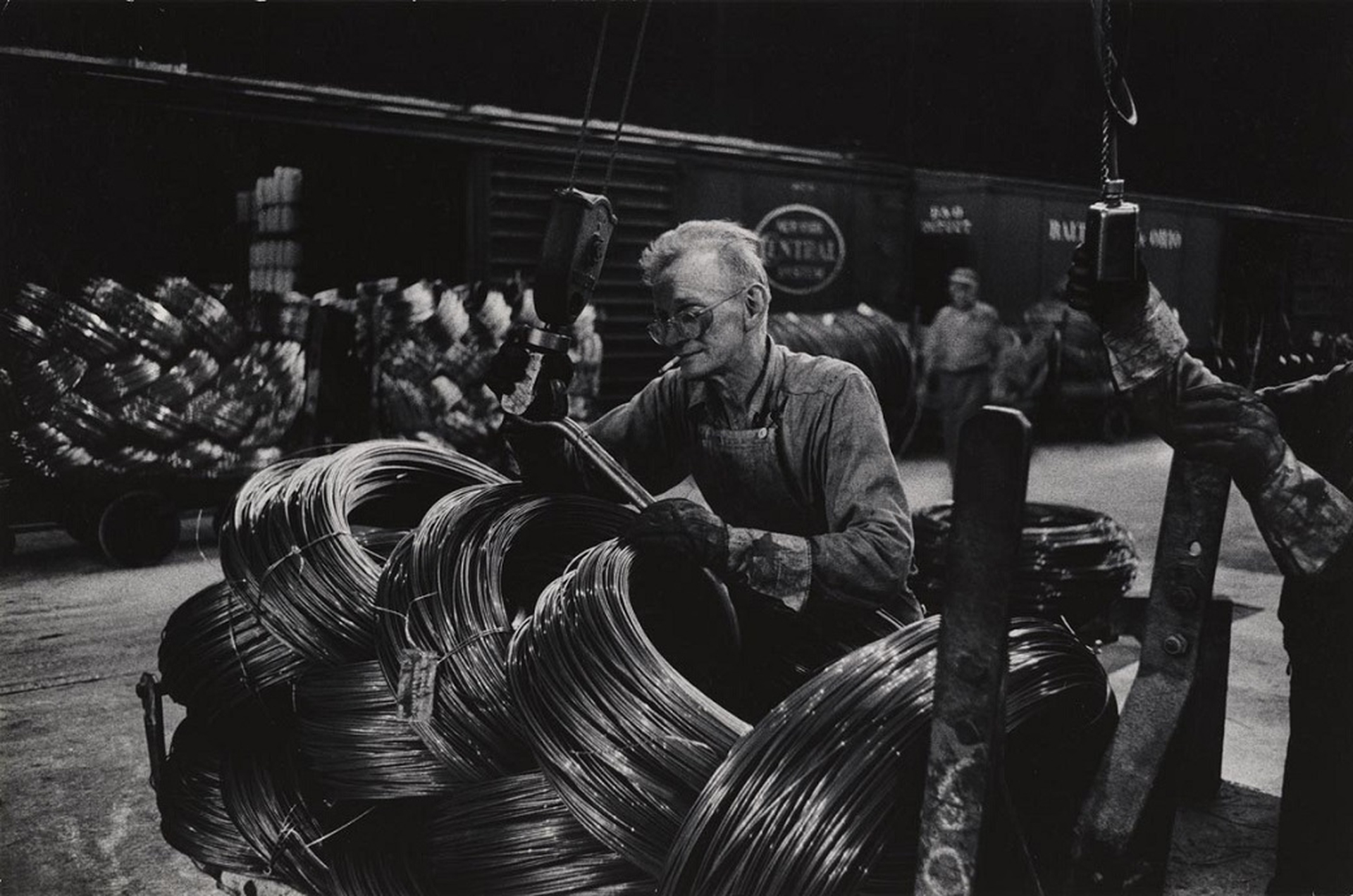 Eugene Smith Mill Man Loading Coiled Steel