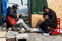 The Calais sessions: l’orchestra di rifugiati nella Giungla di Calais