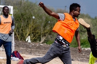 No barriers or walls, playing football with the Calais Jungle’s refugees