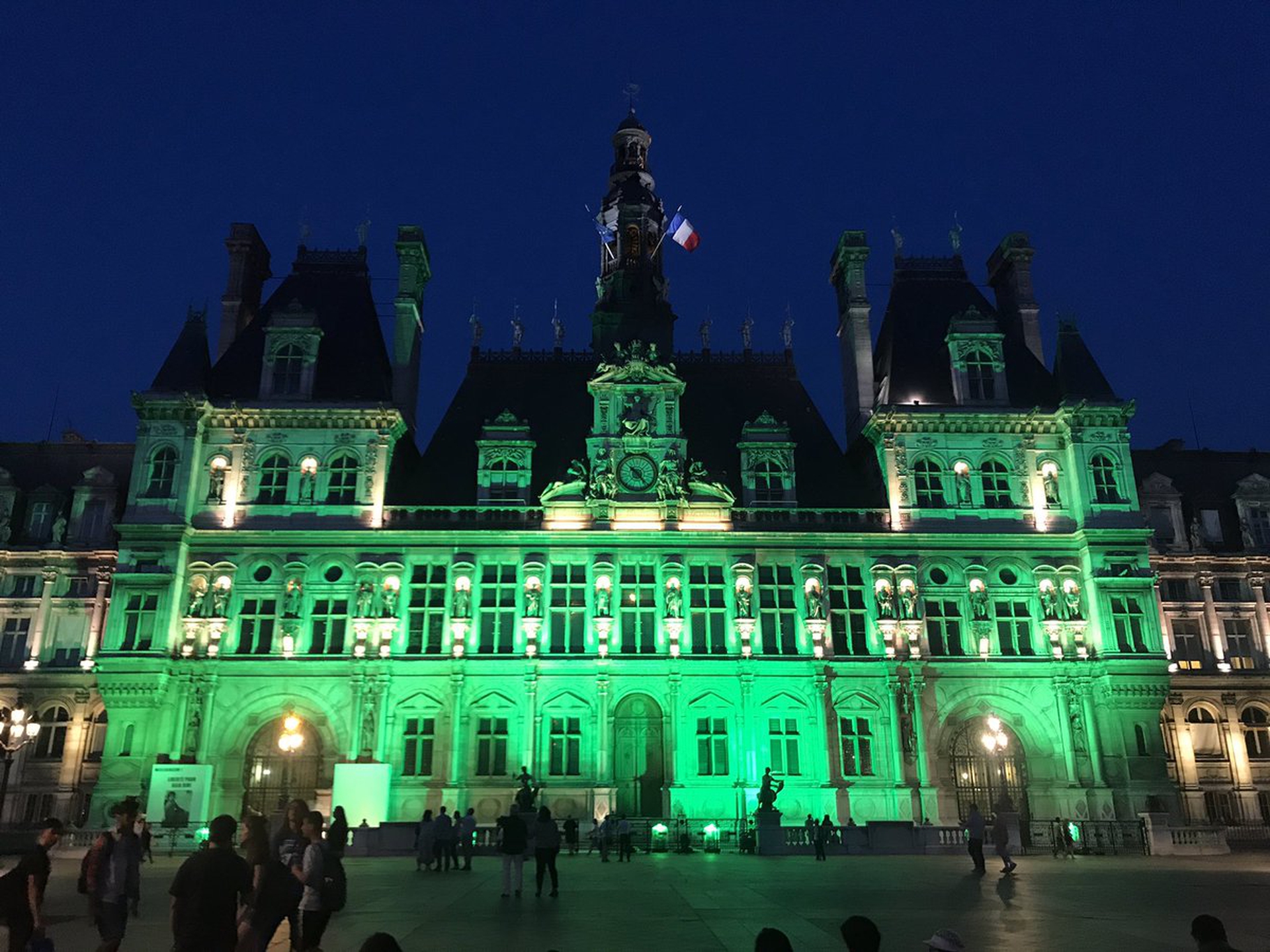 Cities light up green to stand for the Paris Agreement