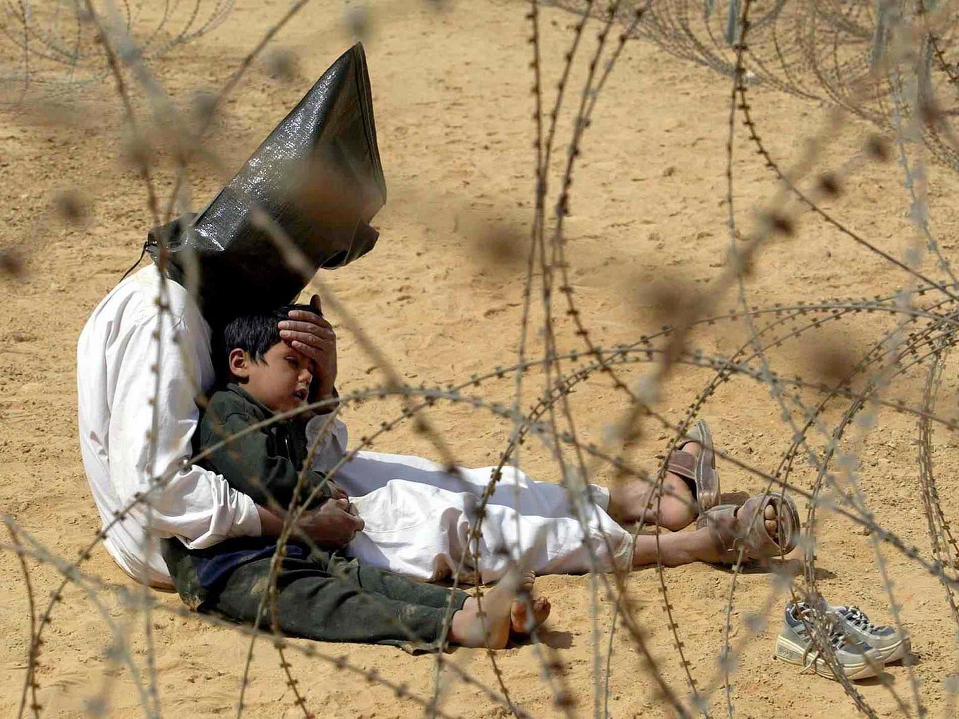 2003, Jean-Marc Bouju: Un prigioniero ed il figlio