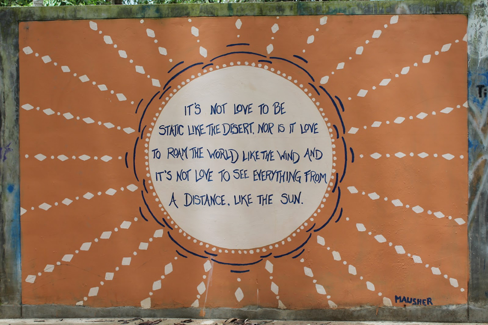 The wall separating Tonsai from the sea