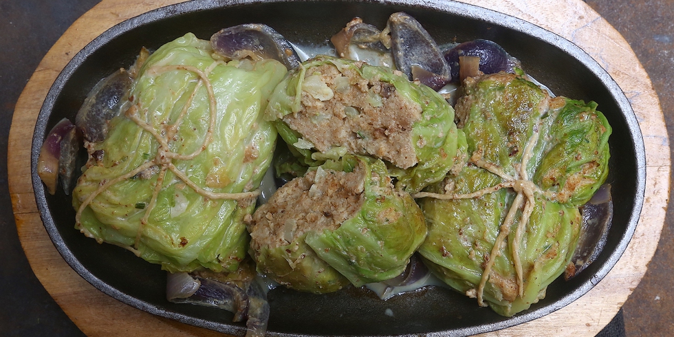 Involtini di verza ripieni di funghi e formaggio, ricetta vegetariana