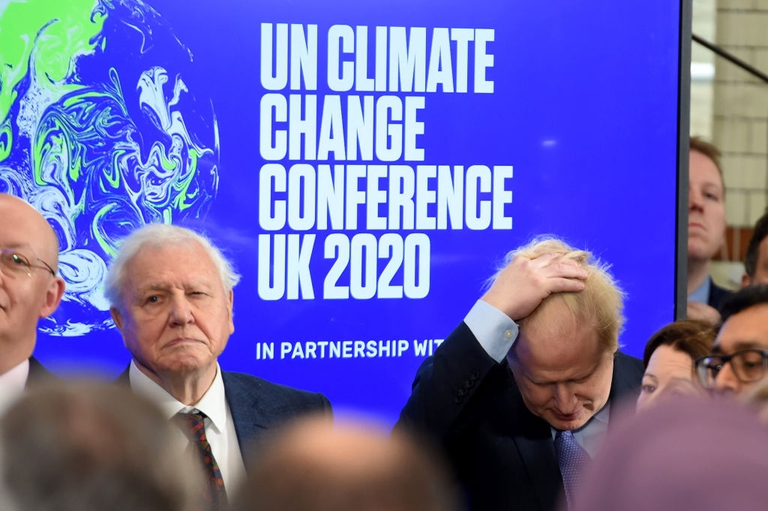 LONDON, ENGLAND - FEBRUARY 04: Sir David Attenborough and Prime minister Boris Johnson (R) attend the launch of the UK-hosted COP26 UN Climate Summit, being held in partnership with Italy this autumn in Glasgow, at the Science Museum on February 4, 2020 in London, England. Johnson will reiterate the government's commitment to net zero by the 2050 target and call for international action to achieve global net zero emissions. The PM is also expected to announce plans to bring forward the current target date for ending new petrol and diesel vehicle sales in the UK from 2040 to 2035, including hybrid vehicles for the first time. (Photo by Jeremy Selwyn - WPA Pool/Getty Images)