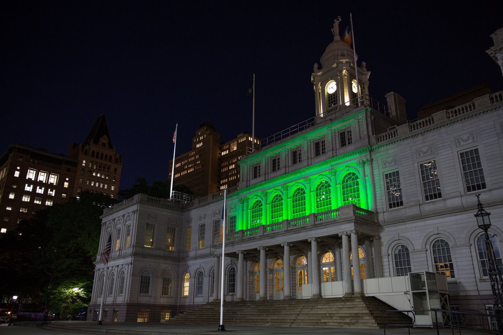 Cities light up green to stand for the Paris Agreement
