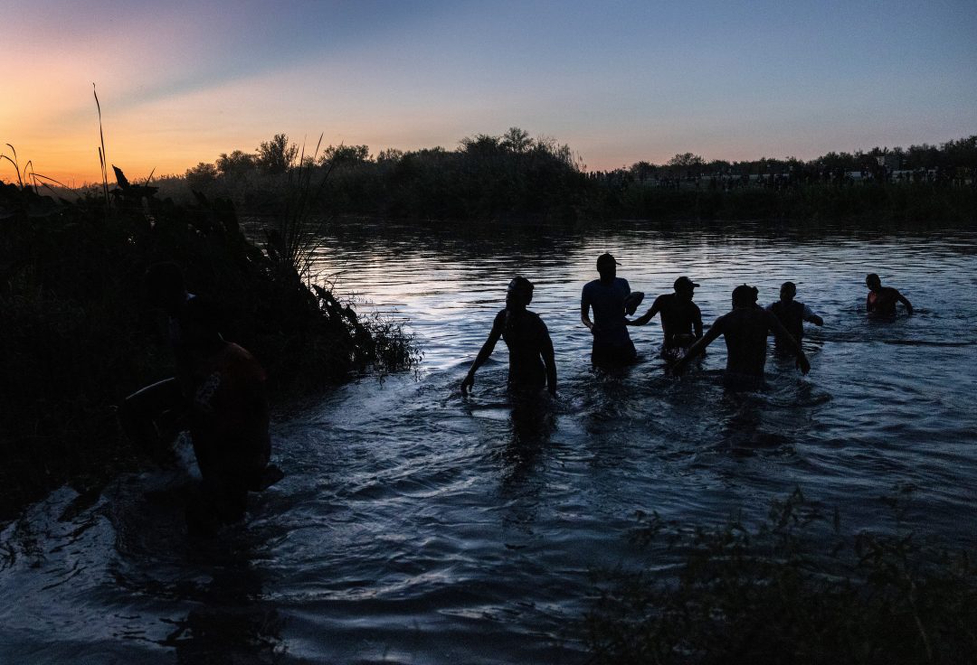 Large Migration Surge Crosses Rio Grande Into Del Rio, Texas