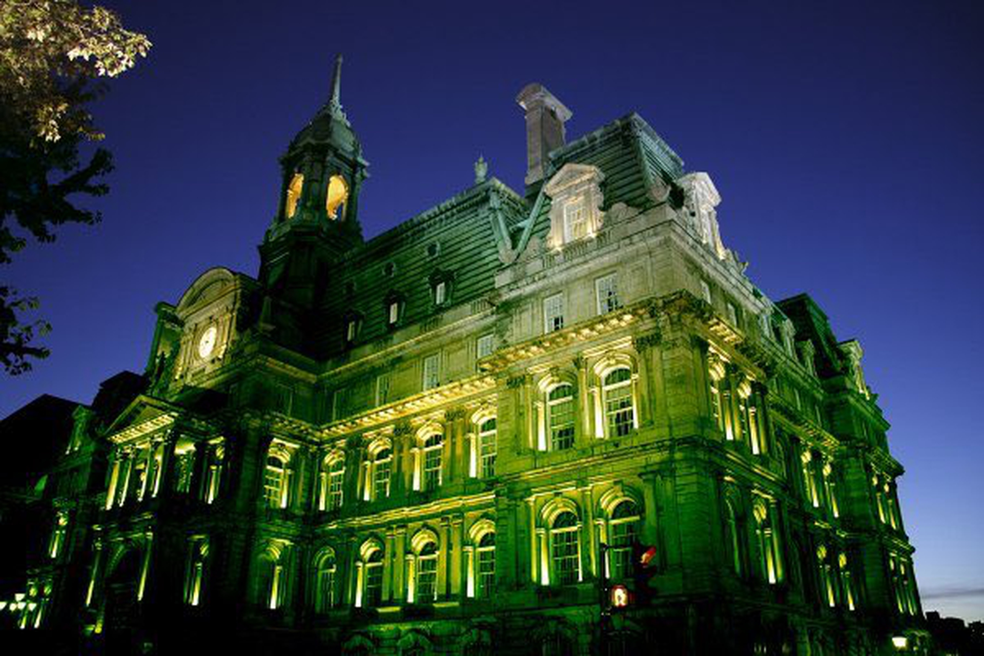 Cities light up green to stand for the Paris Agreement